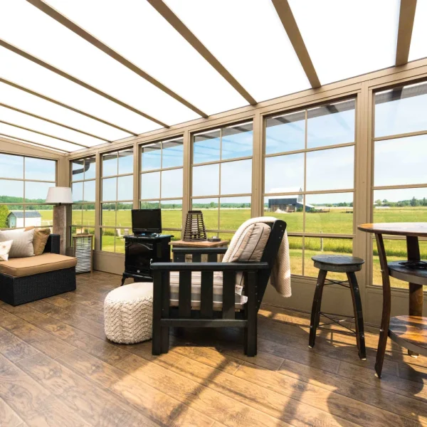 WeatherMaster vinyl windows surrounding a bright three-season sunroom